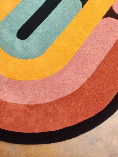 Hand Tufted Oval Shape Area Rug - Multicolor